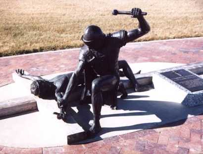 Route Texas Statues Nailing Jesus to the cross