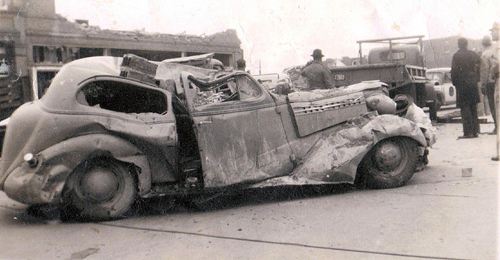 Car and main street after tornado, Higgins Texas 1947 tornado