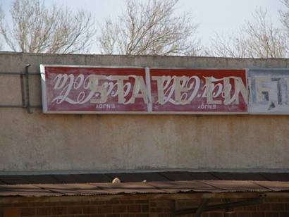 Caca-Cola upside down ghost sign, Maple, Texas
