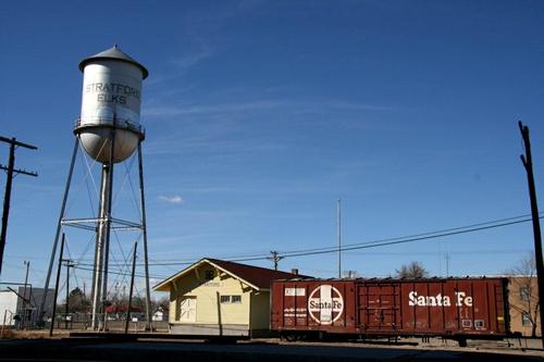 Stratford Texas water tower, depot and  Santa Fe  railroad boxcars