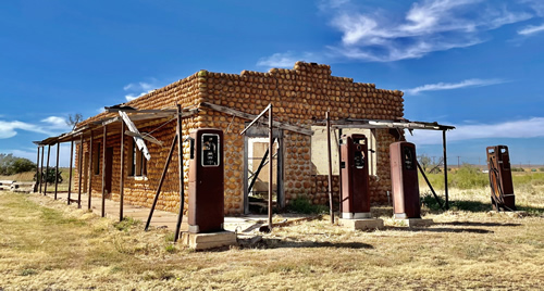 Medicine Mound TX - Old gas station, gas pumps, the W.W. Cobb Building