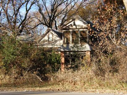 O'Brien Tx Overgrown House