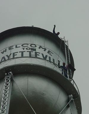 water tower crew and water level gauge