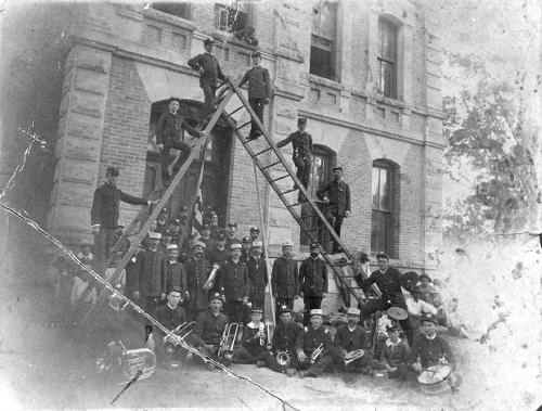 Columbus TX - Uniformed Band on Ladders at the Colorado County Courthouse 1890s