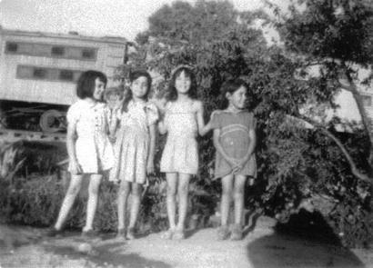 Box car and 4 girls in West Texas