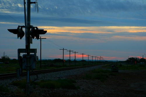 Pecos, Texas railroad crossing at dawn