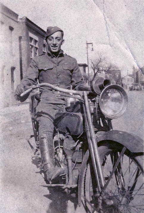 Private Buchiccio on motorcycle